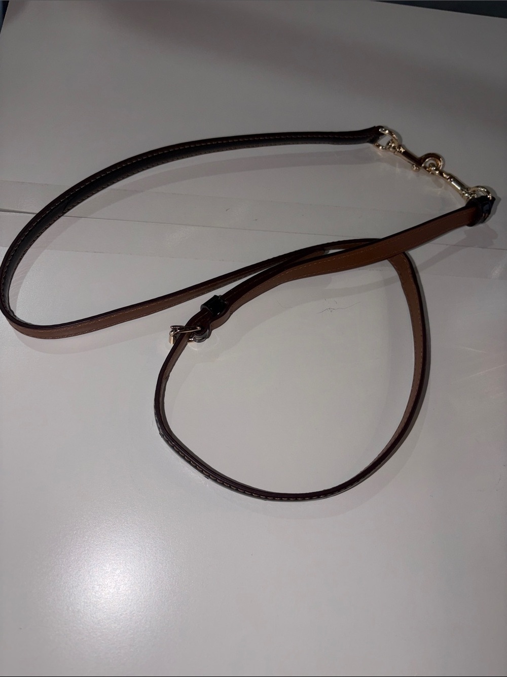 Coach black thin crossbody leather strap gold closure 22-26”